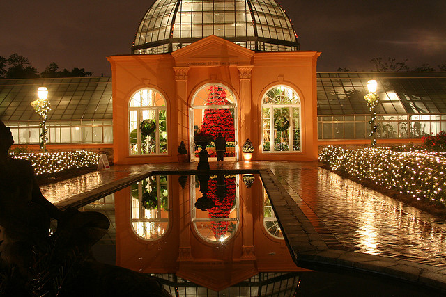 Christmas in the Oaks is kid-friendly but also romantic. Here, the Botanical Garden greenhouse is drenched in light and holiday decor. (Photo courtesy Justin McGregor on Flickr)