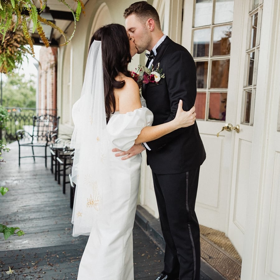 couple getting married kissing