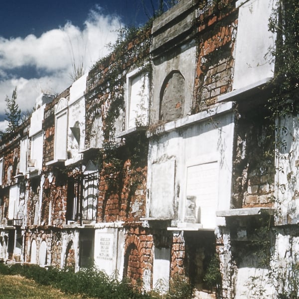 Wall vaults of marble, brick and cement in St. Louis Cemetery No. 1, New Orleans, Louisiana, USA. Vaults in New Orleans are often above ground because of the high water table. Photo taken in 1953.