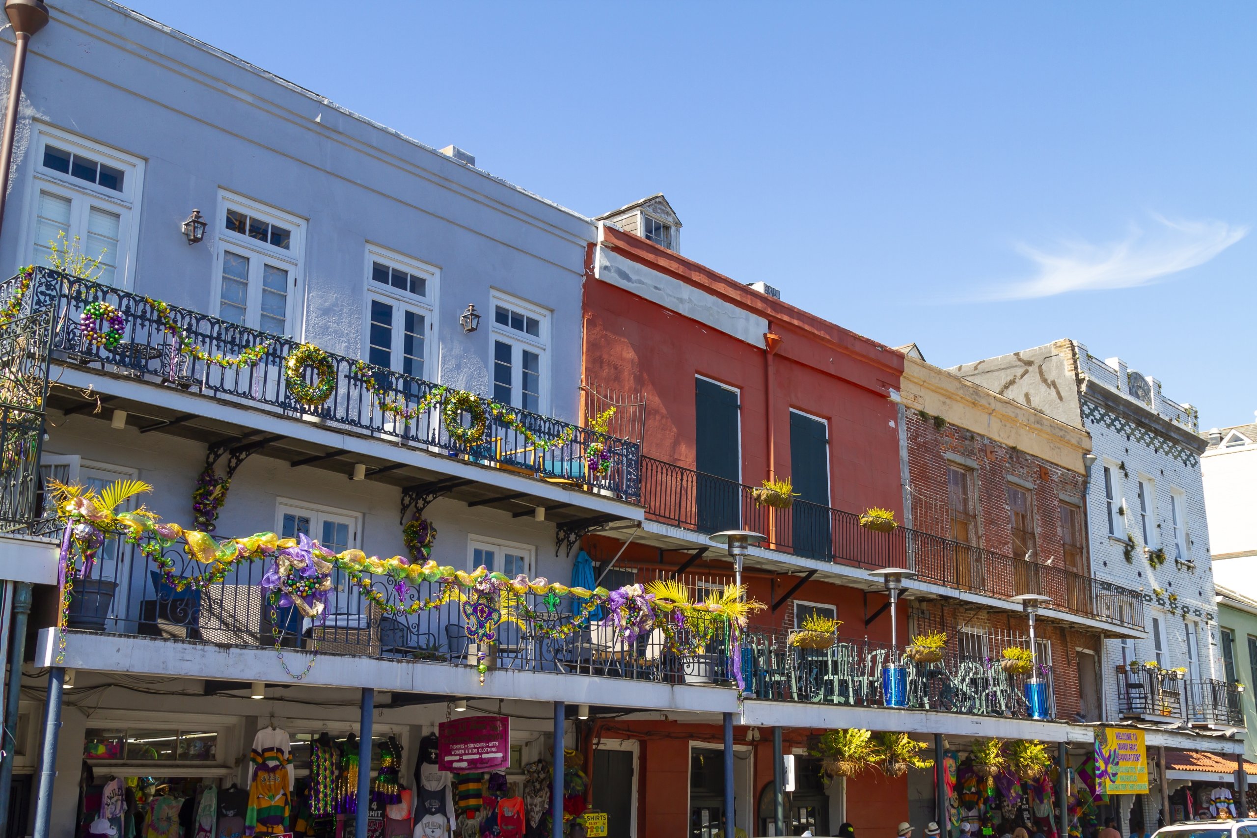 New Orleans, Louisiana in Mardi Gras Carnival Celebrations. Balconies of colorful buildings decorated with Mardi Gras beads and festive decorations in the French Quarter of New Orleans, Louisiana, a popular travel destination