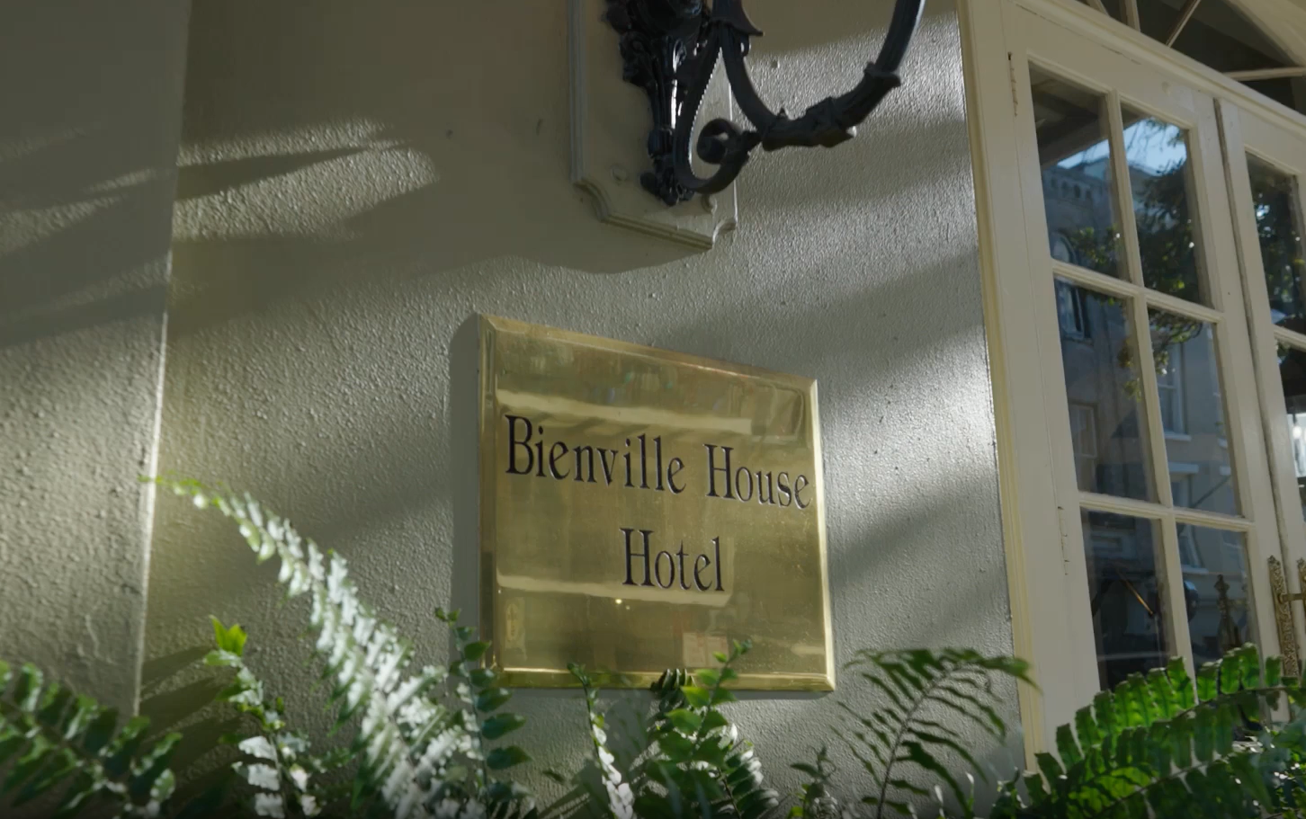 A brass plaque reading 